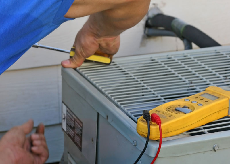 Heat pump maintenance in progress
