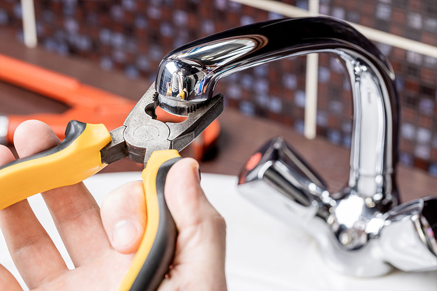 Faucet repair & installation in progress